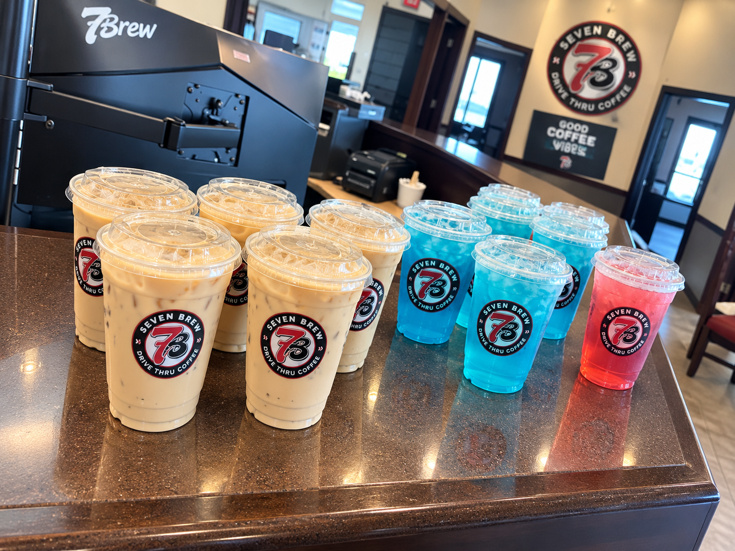 Iced coffee, Rebel energy drinks and lemonade lined up at the 7 Brew Bismarck counter