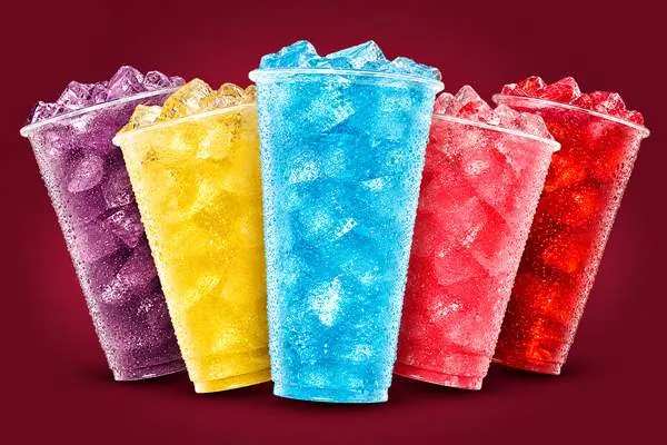 Five colorful iced 7 Energy drinks in purple, yellow, blue, pink and red