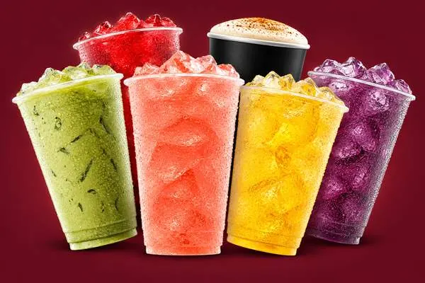 Iced matcha, pink and yellow lemonades, purple and red 7 Brew drinks with a chai cup