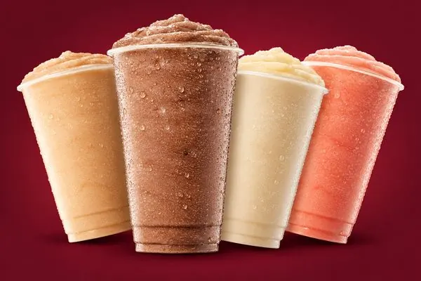 Four 7 Brew shakes in caramel, chocolate, vanilla and strawberry