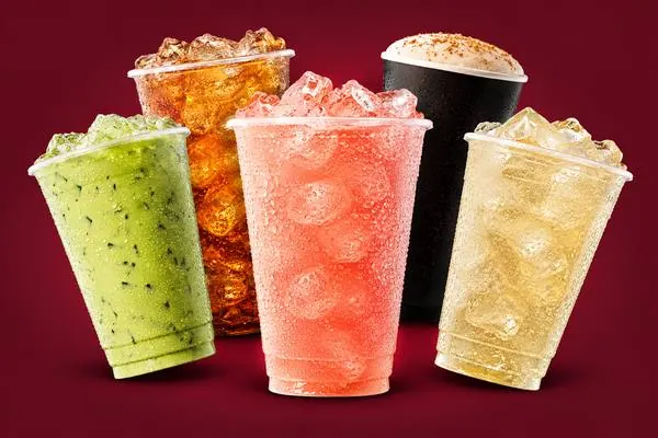 Iced matcha, iced tea, pink lemonade, chai and pale yellow drinks from the 7 Brew teas menu